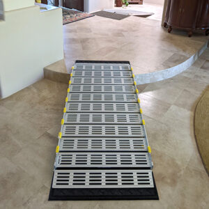 Portable ramp in a living room that can support up to 1000lbs.