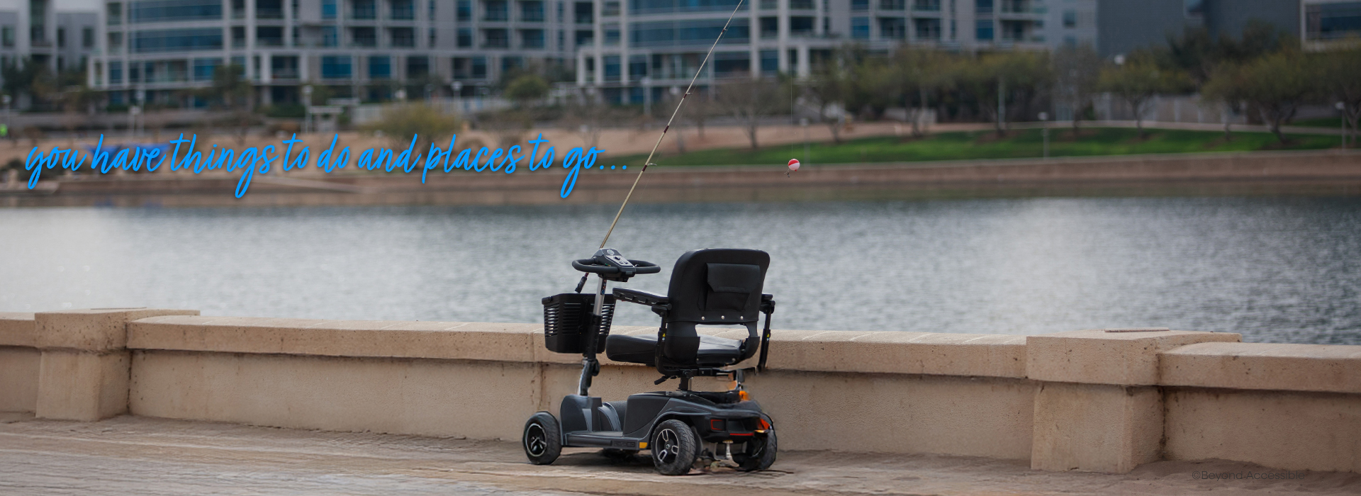 when you have places to go and things to do... photo of a scooter next to a lake with a fishing rod in the basket