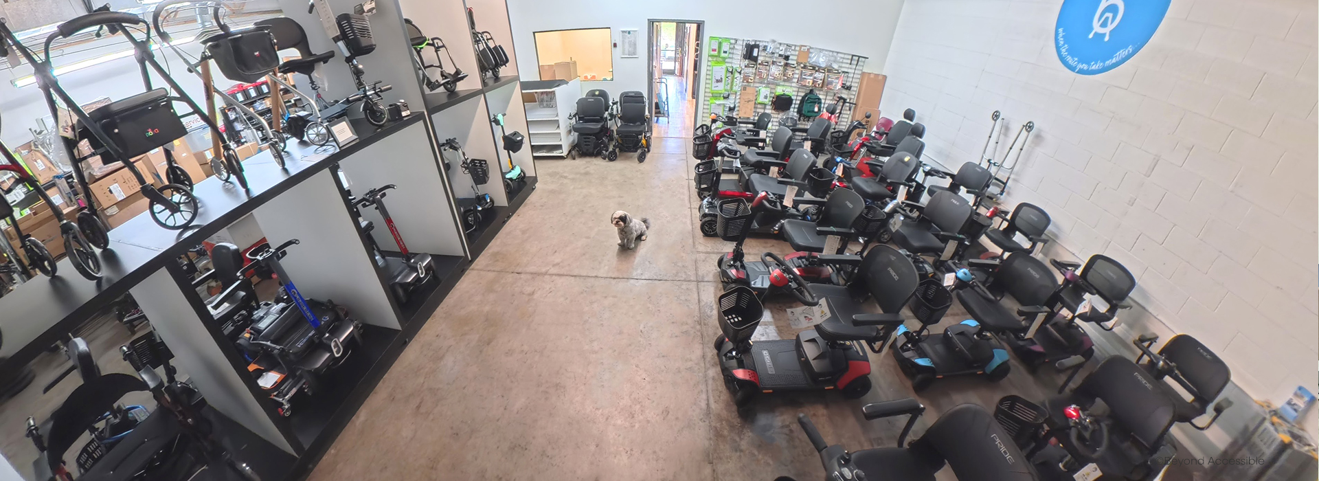 Warehouse filled with scooters, powerchairs, rollators and ramps